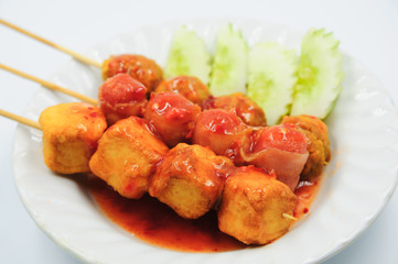 Fried meatballs on white background