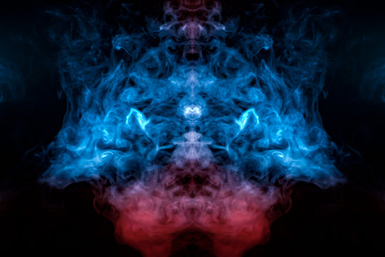 Burning blue fire smoke, rising up like a column from a purple-red base, intertwined in a pattern of a crown, on a black background.