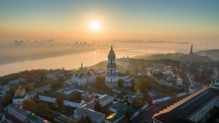 Skyline, Kiev city with beautiful morning sky. Pedestrian bridge. Left bank the Dnieper River.