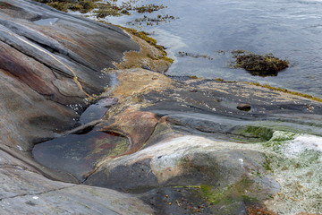 Beginning of a pothole created by tidal current in Northern Norway.
