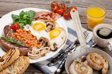 English breakfast. Fried eggs, sausages, bacon