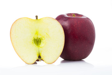 Red apple whole and halves piece isolated on white background