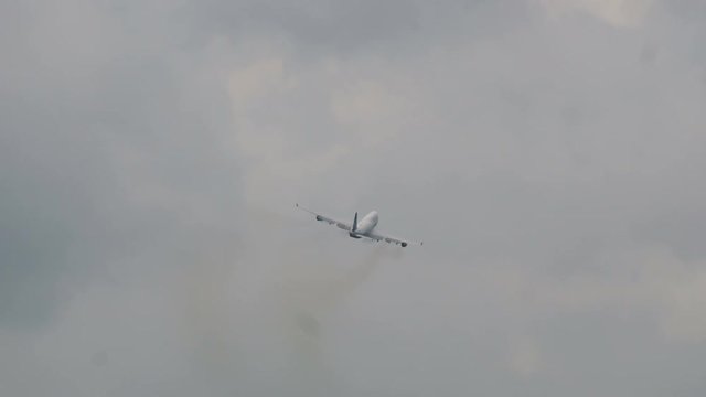 4-engine airplane flying after takeoff