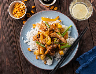 Kung Pao chicken, stir-fried Chinese sichuan traditional sichuan  dish with chicken, peanuts, vegetables and chili peppers.