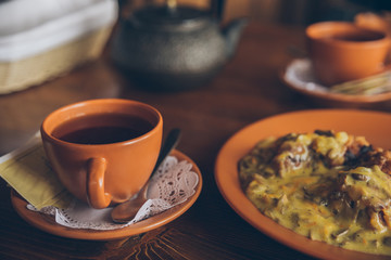 tea cup close up in cafe. warm up drink