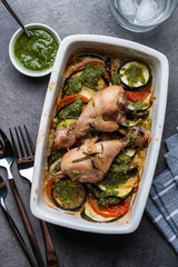 Ratatouille with chicken and pesto. French cuisine. Rosemary chicken with oven-roasted ratatouille.