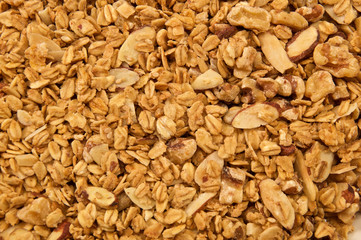 Looking down on home made, all natural, organic granola. The cereal fills the entire image.
