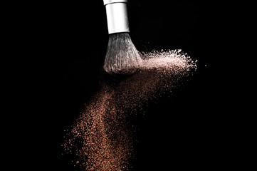 Living Coral Color of the year 2019, powder splash and brush for makeup artist or beauty blogger in black background