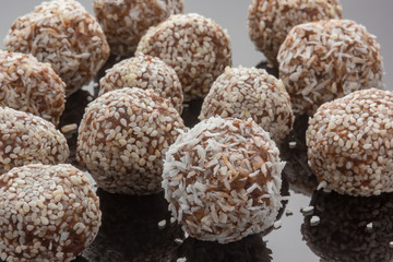 Close up of No Bake Energy Balls on mirror background. Soft focus