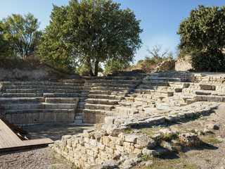 Fototapeta na wymiar The Odeon and Bouleuterion or the ancient concert theatre and the Assembly House in ancient Troy city, Canakkale Province, Turkey.