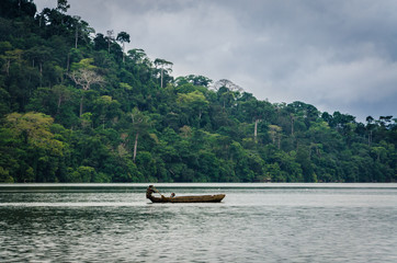 Simple wooden dugout canoe on Barombi Mbo crater lake of Cameroon, Africa.