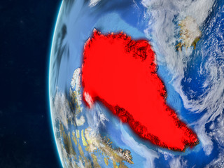 Greenland from space on model of planet Earth with country borders and very detailed planet surface and clouds.