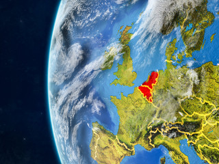 Benelux Union from space on model of planet Earth with country borders and very detailed planet surface and clouds.