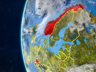 EFTA countries from space on model of planet Earth with country borders and very detailed planet surface and clouds.