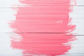 pink and white painted wooden background