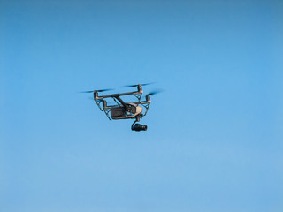 Drone are flying in the sky.