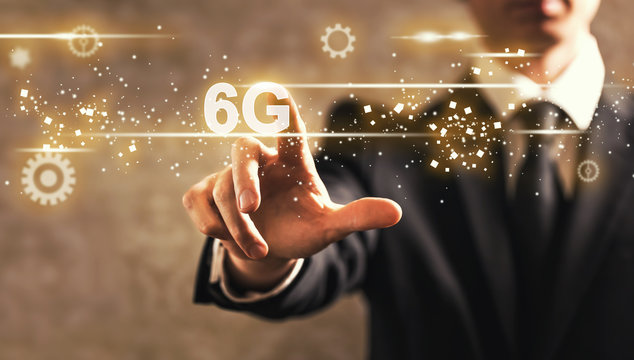 6G text with businessman on dark vintage background