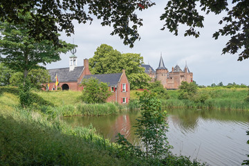Fototapeta premium View of the Muiden Castle national museum from the ramparts in summer