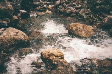 Mountain stream and large stones.