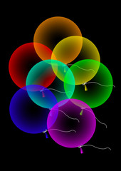 Un bouquet  de ballons multicolores dans la nuit