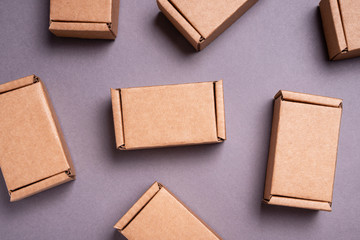Set of cardboard boxes on grey background