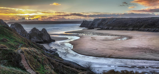 Panoramic sunset at Three Cliffs Bay, Gower, Swansea, UK