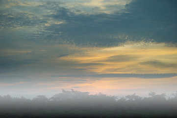 Obraz premium Sky and sun Blue and orange in the sky in summer.