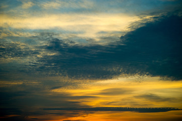 Sky and sun Blue and orange in the sky in summer.