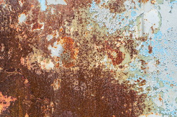 Old cracked paint on rusty metal plate