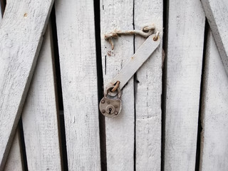 Lock on old wooden door