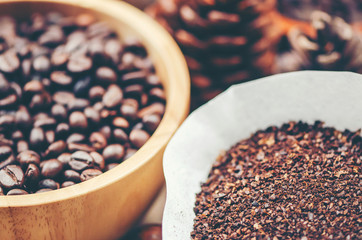 coffee beans on wooden background, arabica coffee, vintage filter image
