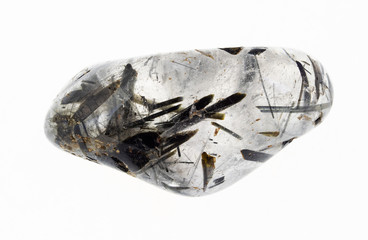 tumbled clear quartz with Tourmaline crystal - obrazy, fototapety, plakaty