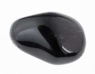 tumbled obsidian) gemstone on white