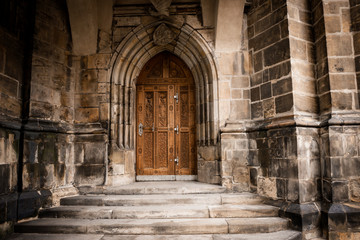 Prague Castle - Gothic architecture of st. Vitus cathedral back door. Czech Republic. Travel photography