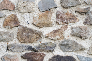 Uniform texture of large sandstone fragments.