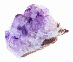 matrix of raw amethyst crystals on white