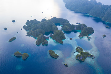 Aerial View of Rock Islands, Reef, and Ocean in Raja Ampat