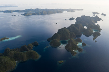 Aerial of Peaceful Ocean and Limestone Islands in Misool, Raja Ampat © ead72