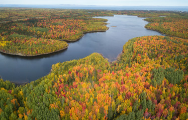 Aerial panoramic view of a beautiful Canadian Landscape during fall color season. Taken near Belledune, New Brunswick, Canada.