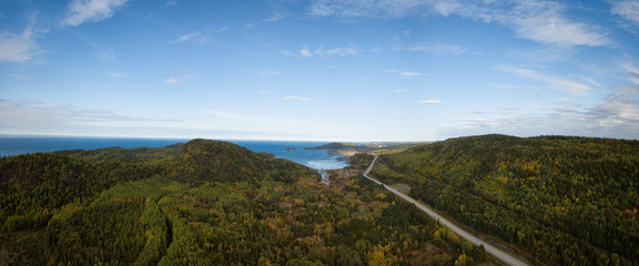 Aerial panoramic landscape view of Bic National Park during a vibrant sunny day. Taken in Le Bic, Rimouski, Quebec, Canada.