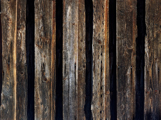 Aged wooden background. Dark natural wooden background. Old beautiful background from wooden boards.