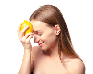 Beautiful woman with lemon beauty fashion skin freshness face on a white background. Isolation