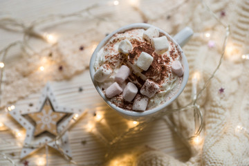 Winter hot drink, cacao with marshmallows and christmas decorations, spicy hot chocolate