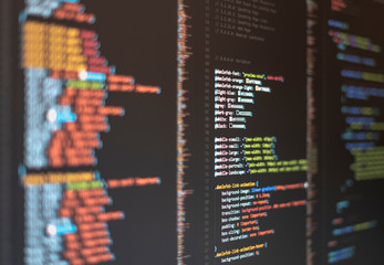 Web developer's computer screen with code