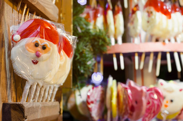 festive santa lollipop on the christmas street market