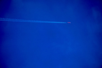 Clearly beautiful blue sky with white line plane.