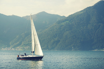 Fototapeta na wymiar Yachting on Iseo Lake, Italy, Europe