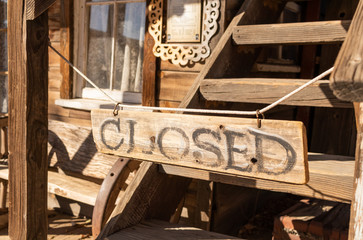 Hand made closed sign in old western style