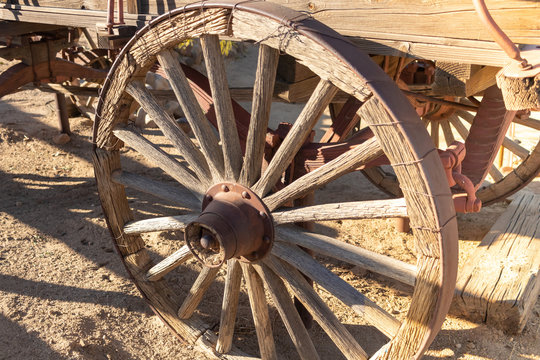 Wooden wagon wheel in old west tourist town