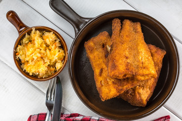 Pieces of cod in breadcrumbs.
